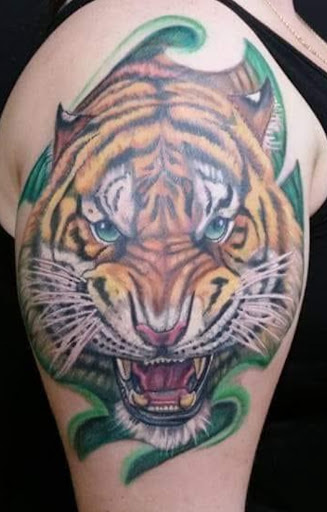 Explore landscape tattoo ideas, creative tattoo ideas in Stuart, available at Tiger Shark Tattoo Studio