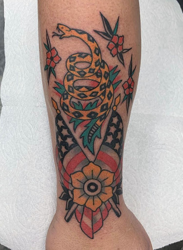 Find bat tattoo ideas for your next unique tattoo in Orange at Black Palm Tattoo