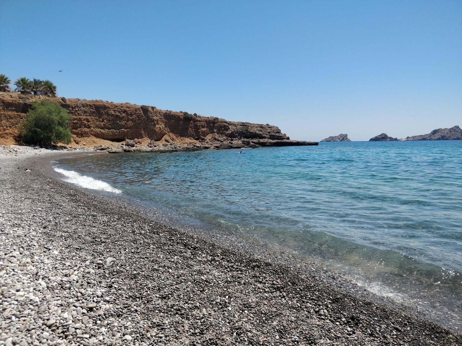 Ligia Lakos beach'in fotoğrafı çok temiz temizlik seviyesi ile