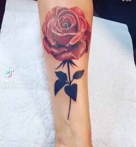 Explore wrist tattoo ideas for men, creative tattoo ideas in Orange, available at Ink Activitiez Tattoo