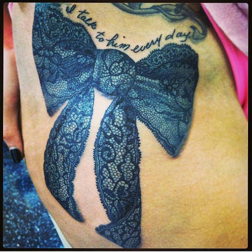 Find time clock tattoo ideas for your next unique tattoo in Pendleton at Just Another Hole in the Wall Tattoo