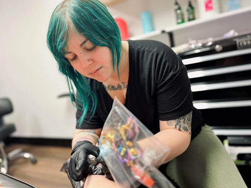 Explore daisy flower tattoo ideas, creative tattoo ideas in Marshall, available at Vixens Ink & Beauty