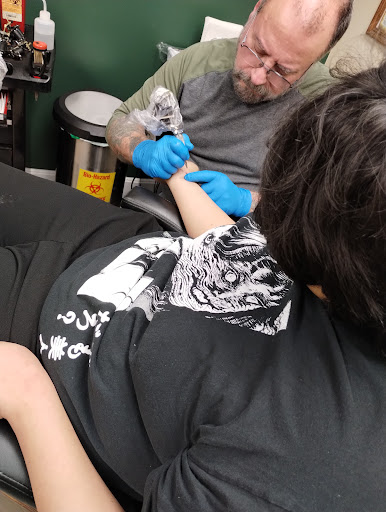 Explore st christopher tattoo ideas, creative tattoo ideas in Topeka, available at Artist Alley Studio Tattoos & Piercings