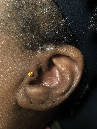 Explore cross cover up tattoo ideas, creative tattoo ideas in Bloomington, available at Evil by the Needle Custom Tattoo and Piercing Studio