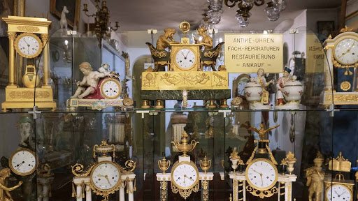 Antike Uhren Romann | Uhrmacher München