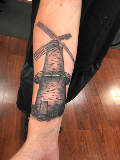 Explore dope tattoos ideas, creative tattoo ideas in Largo, available at Alchemy Tattoos and Body Piercings