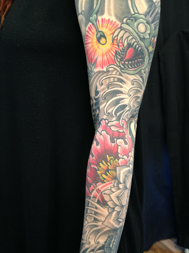 Explore shoulder tattoo ideas for guys, creative tattoo ideas in Peoria, available at Iron Key Tattoo Studio Inc.