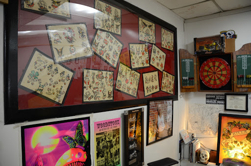 Explore pretty flower tattoo ideas, creative tattoo ideas in Madisonville, available at Cherokee Tattooing & Motorcycles
