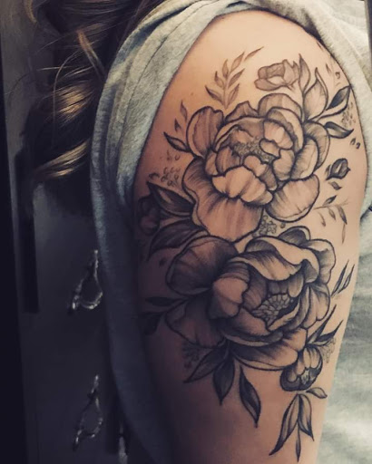 Explore sleeve cover up tattoo ideas, creative tattoo ideas in Shelbyville, available at Stage Left Tattoo and Piercing