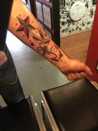 Explore knuckle tattoo ideas, creative tattoo ideas in Canal Fulton, available at Archangel Tattoo & Art Gallery