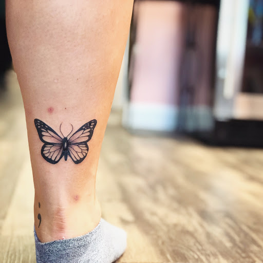 Explore skulls tattoo ideas, creative tattoo ideas in Batavia, available at The Pretty Pin-Up Tattoo Parlor