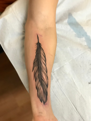 Explore women's tattoo placement ideas, creative tattoo ideas in Milwaukee, available at West Allis Tattoo & Gallery Tattoo Shop Milwaukee