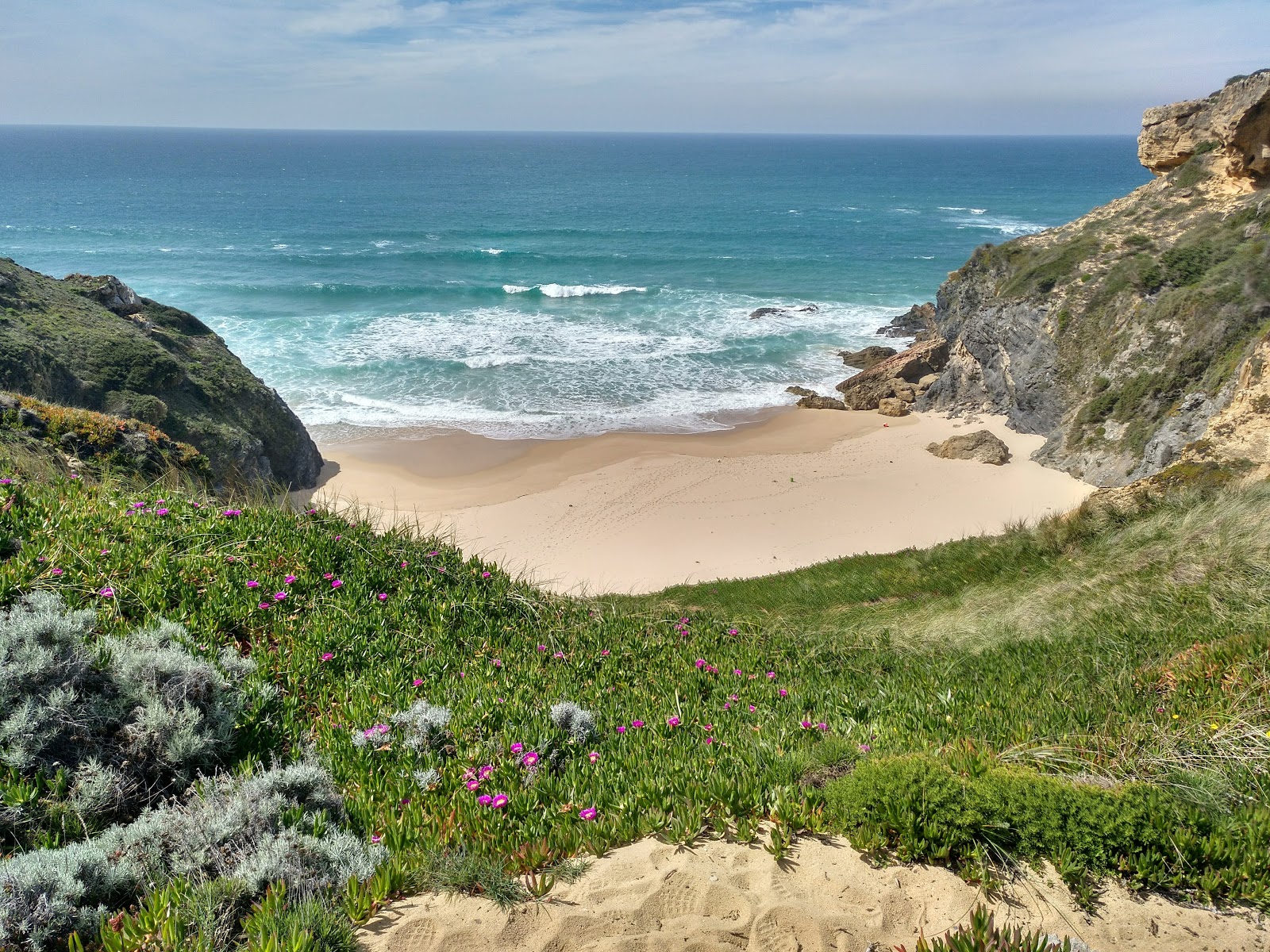 Photo of Angra da Cerva with bright fine sand surface