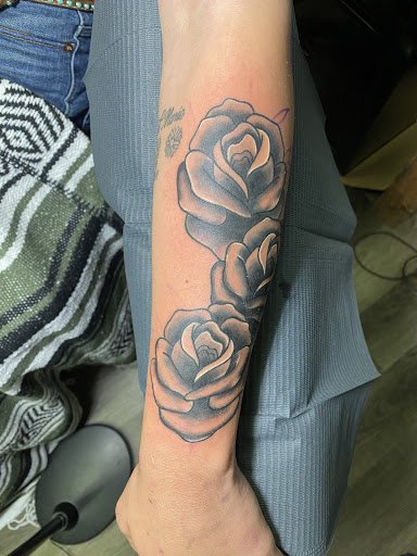 Find symbol ideas for tattoos for your next unique tattoo in Winter Park at Black Pine Tattoo