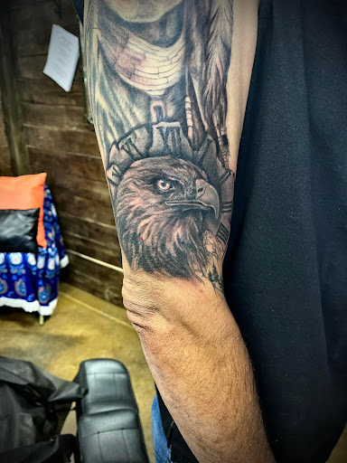 Explore full back tattoo ideas for men, creative tattoo ideas in Randleman, available at Hidden Lotus Tattoo