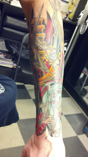 Explore gothic hand tattoo ideas, creative tattoo ideas in Pelham, available at Tattoo Fever