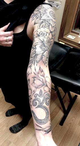 Explore mother and son matching tattoos ideas, creative tattoo ideas in Ironwood, available at Iron Ink Tattoos