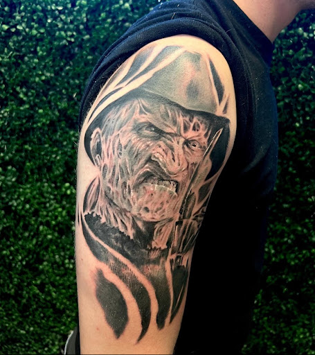 Explore anti government tattoo ideas, creative tattoo ideas in Oviedo, available at Fine Ink Studios Tattoos