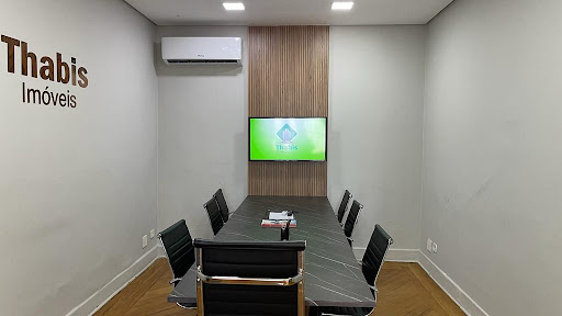 Logo da empresa - Thabis Imóveis
