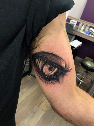 Explore black mens tattoo ideas, creative tattoo ideas in Sandwich, available at Family Pride Tattooing and Piercing