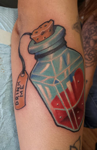 Explore massage therapy tattoo ideas, creative tattoo ideas in Glendale, available at Ace Tattoo and Piercing
