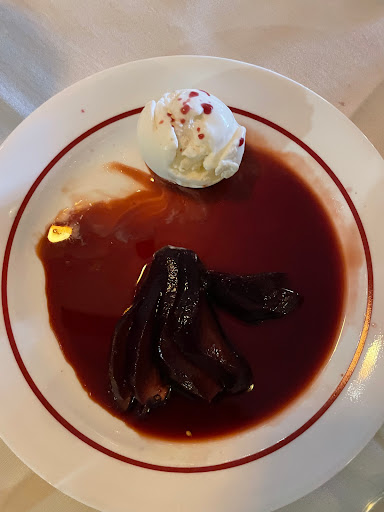 Poached pear with ice cream