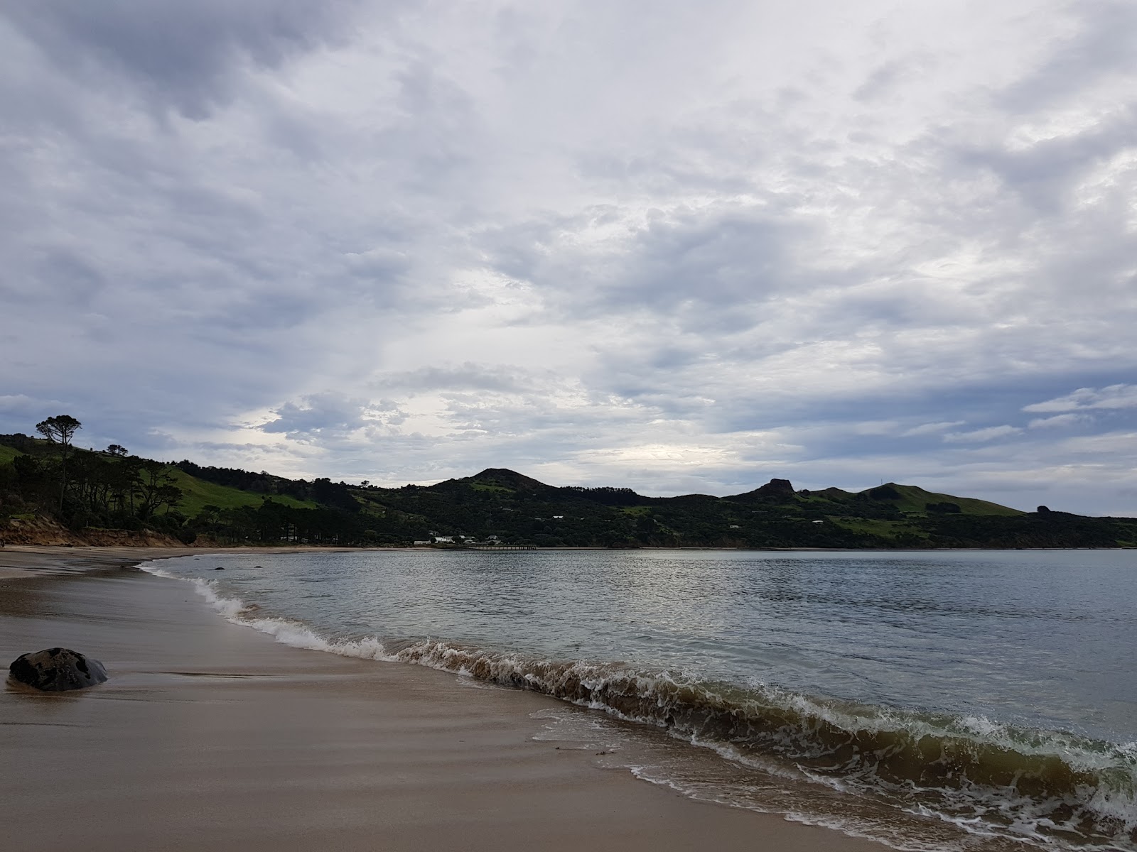 Fotografija Lucy Baxter Beach z turkizna voda površino