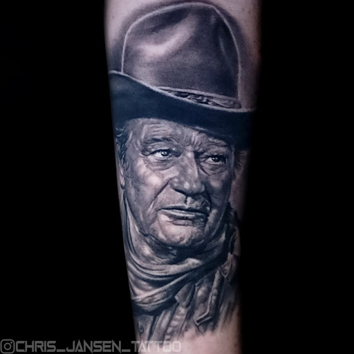 Explore lower back tattoo ideas for females, creative tattoo ideas in Boise, available at Ink Slaves Tattoo