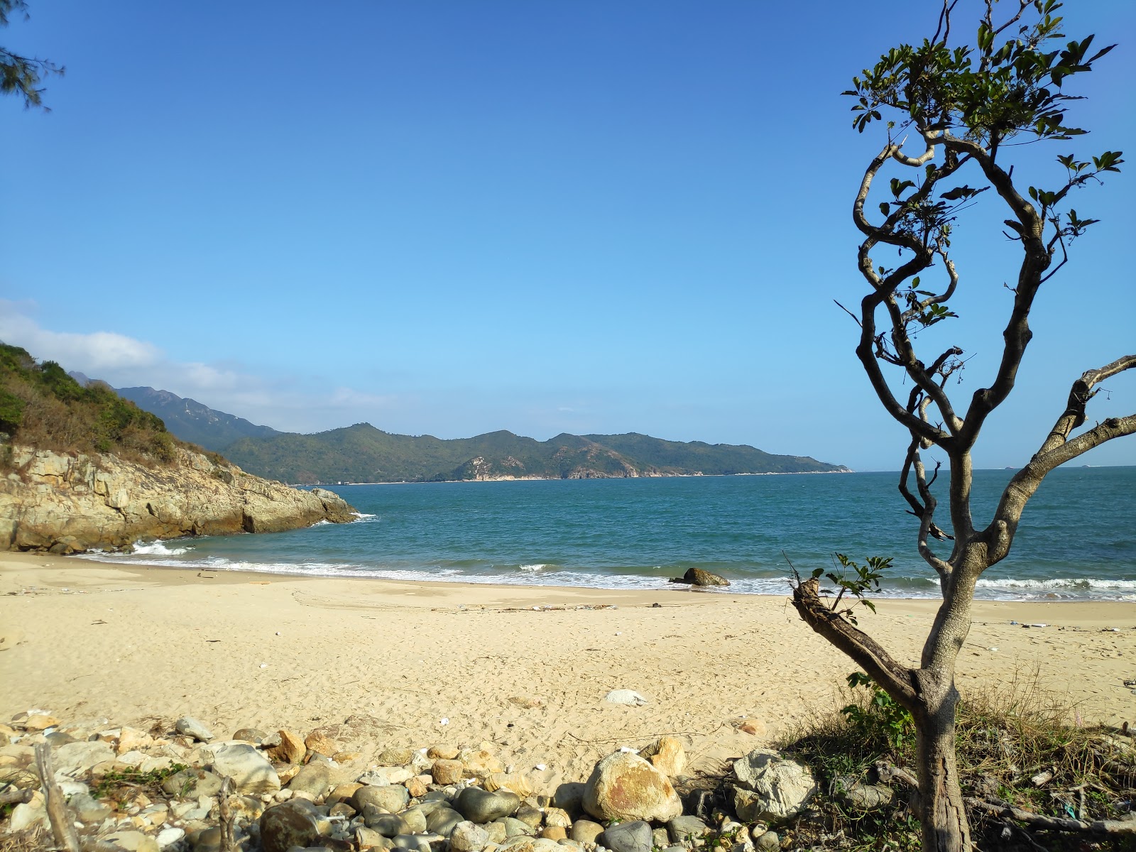 Tai Long Wan Campsite的照片 带有明亮的沙子表面