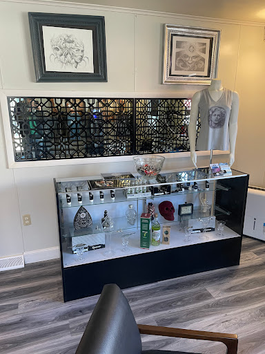 Explore hand tattoo ideas for guys, creative tattoo ideas in Sunbury, available at Absinthe Tattoo