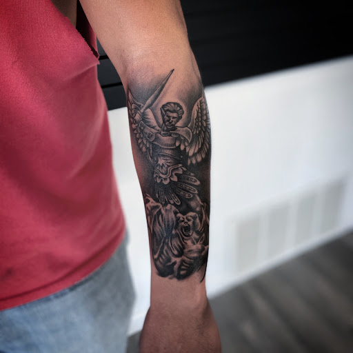 Explore mom tattoo ideas for guys, creative tattoo ideas in Belleville, available at Dark Horse Tattoo Company, LLC
