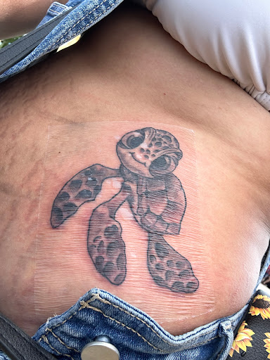 Explore dobby tattoo ideas, creative tattoo ideas in Cocoa Beach, available at The Corner Tattoo and Piercing Studio