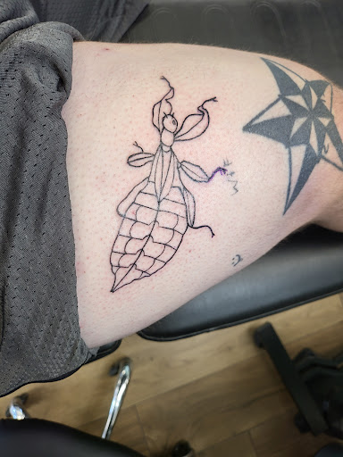 Explore simple neck tattoo ideas, creative tattoo ideas in Cocoa Beach, available at 13 Waves Tattoo