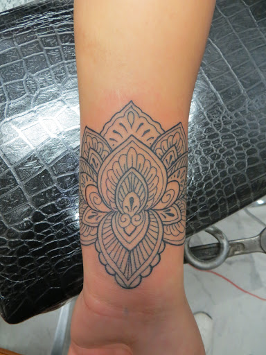 Explore upper chest tattoo ideas, creative tattoo ideas in Englewood, available at White Eagle Tattoo