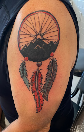 Explore mountain biking tattoo ideas, creative tattoo ideas in Houston, available at 3rd Generation Ink