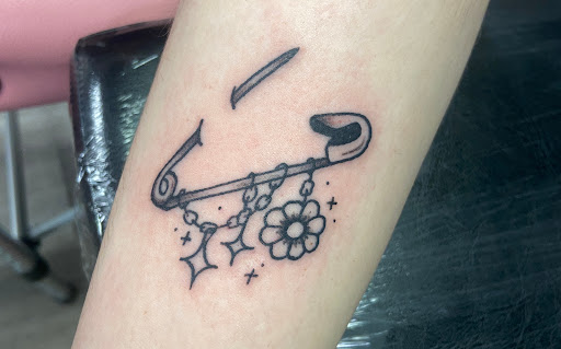 Explore tattoo cover up ideas on forearm, creative tattoo ideas in Plymouth Meeting, available at Shoobie Lee Tattoo Studio