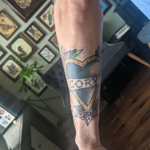 Explore girly tattoo sleeve ideas, creative tattoo ideas in Lawrence, available at Standard Electric Tattooing