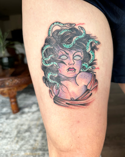 Explore small rose tattoo ideas, creative tattoo ideas in Libertyville, available at Lucky Seven Tattoo
