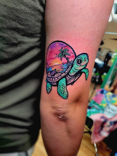 Explore bird family tattoo ideas, creative tattoo ideas in Benton, available at Spectrum Tattoo