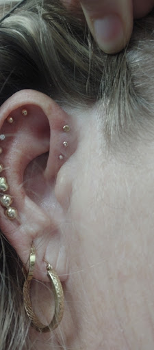 Explore small gap filler tattoo ideas, creative tattoo ideas in Jacksonville, available at East Coast Worldwide Tattoo & Piercing