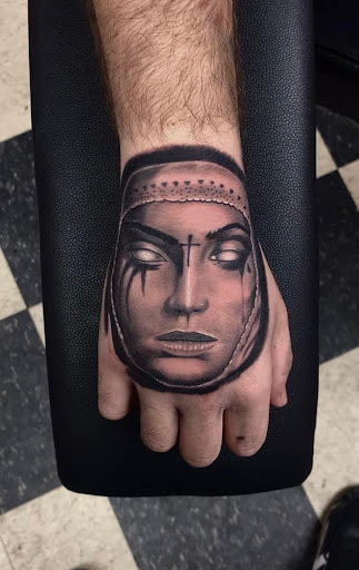 Explore face tattoo ideas for females, creative tattoo ideas in Peru, available at Fade To Black Tattoo Studio