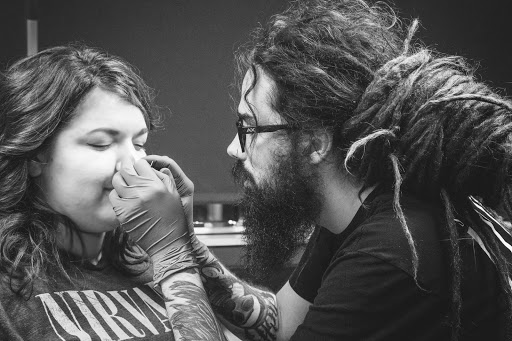 Explore koi sleeve tattoo ideas, creative tattoo ideas in Saint Louis, available at Steel and Ink Tattoo Studio