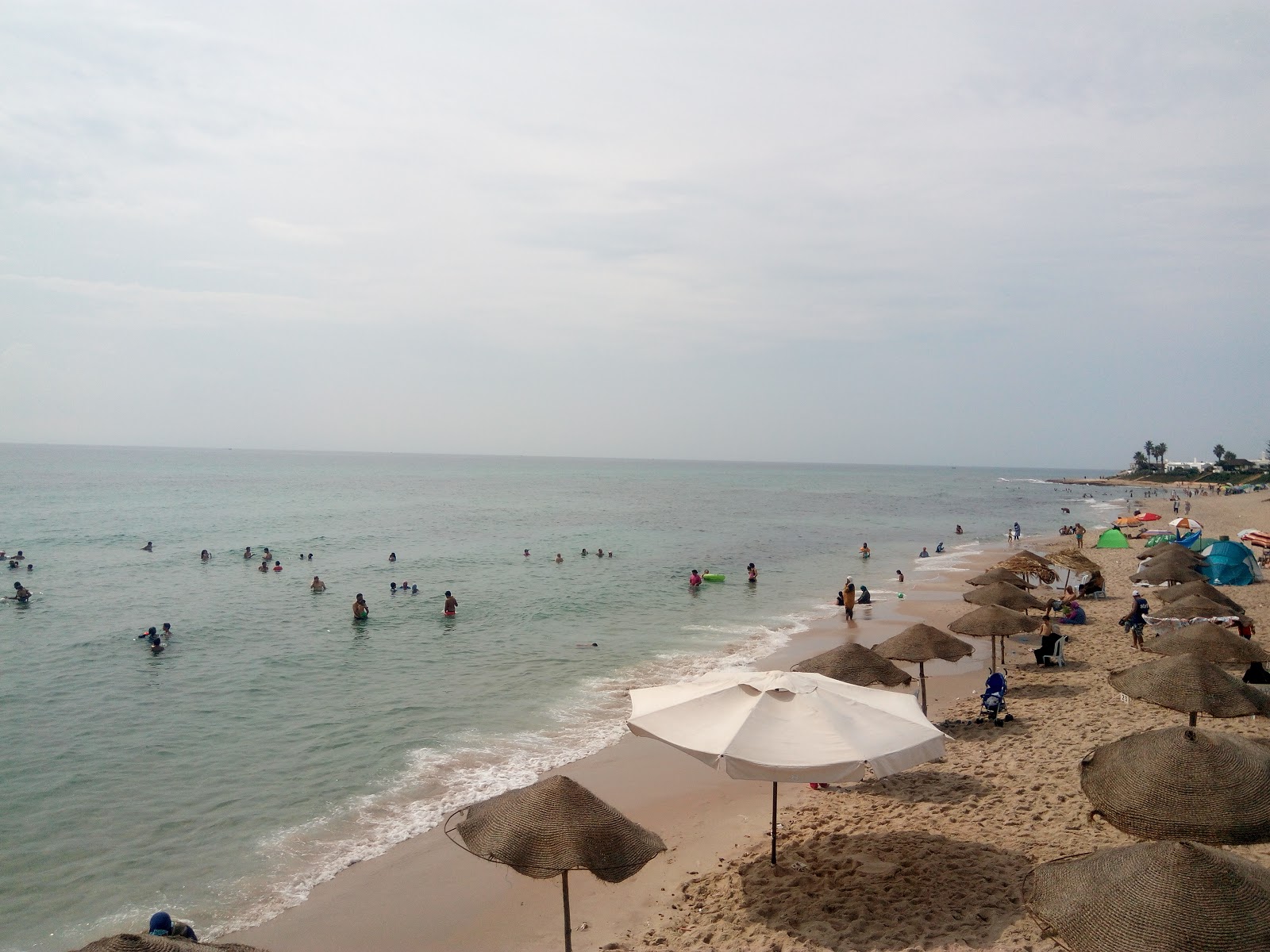 Foto av Maamoura Plage med lång rak strand