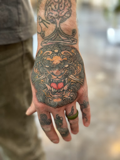 Explore tramp stamp cover up tattoo ideas, creative tattoo ideas in Omaha, available at Caffeinated Caterpillar Tattoo Spa