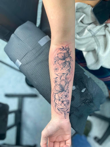 Explore mens sleeve tattoos ideas, creative tattoo ideas in Ocala, available at Beauty in a Canvas Tattoo and Art Gallery