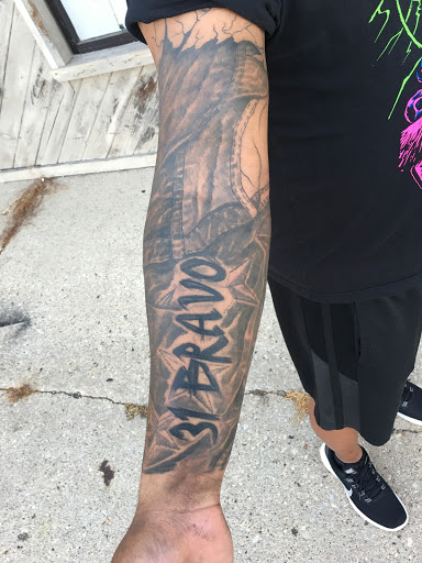 Explore cycle tattoo ideas, creative tattoo ideas in Green Bay, available at Darkside Tattoo By Jesse Skywalker