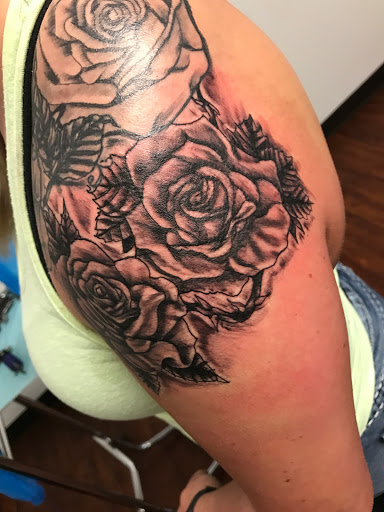 Explore cool christian tattoo ideas, creative tattoo ideas in Seymour, available at American Gypsy Tattoo Corp.