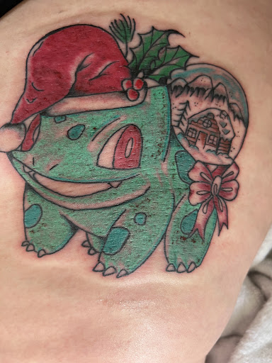 Find cool armband tattoo ideas for your next unique tattoo in Lawrence at Standard Electric Tattooing