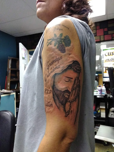 Explore grapevine tattoo ideas, creative tattoo ideas in Omaha, available at A New Creation Tattoo