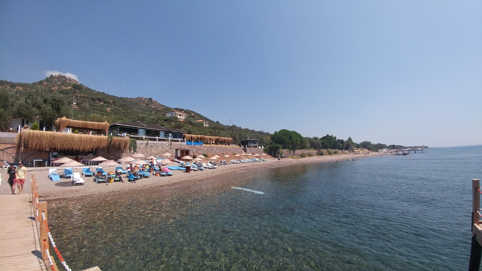 Photo of Kotti beach with light sand &  pebble surface